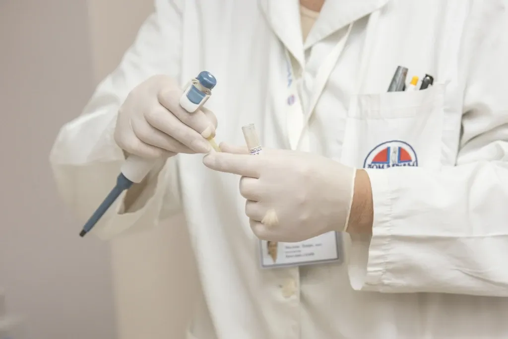 doctor holding IVF shot