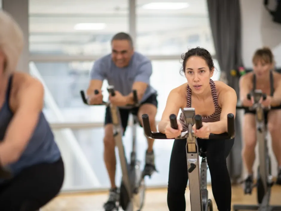 woman indoor cycling